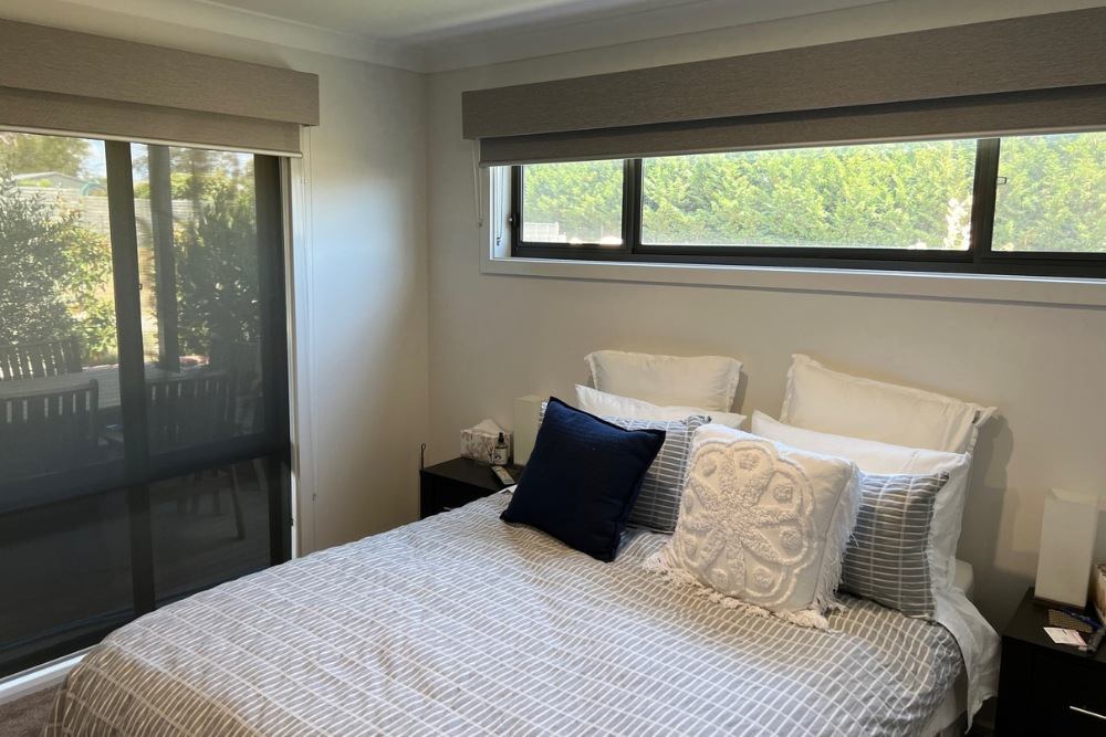 Designing Windows roller blinds with a pelmet installed in a bedroom in Yass and Murrumbateman